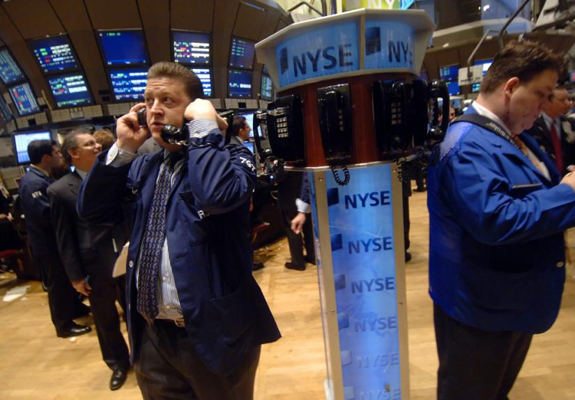 Traders on the floor of the New York Stock Exchange