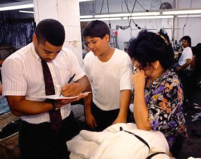 An inspector in a sweatshop in lower Manhattan