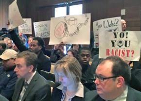 Anti-racist activists confront the University of Wisconsin system Board of Regents