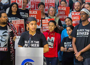 Supporters of Seattle's Block the Bunker campaign speak out against the plan for a new police station